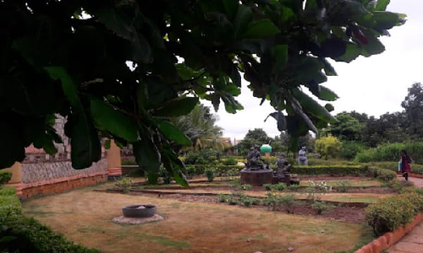 Institute garden seen through overhanging tree foliage